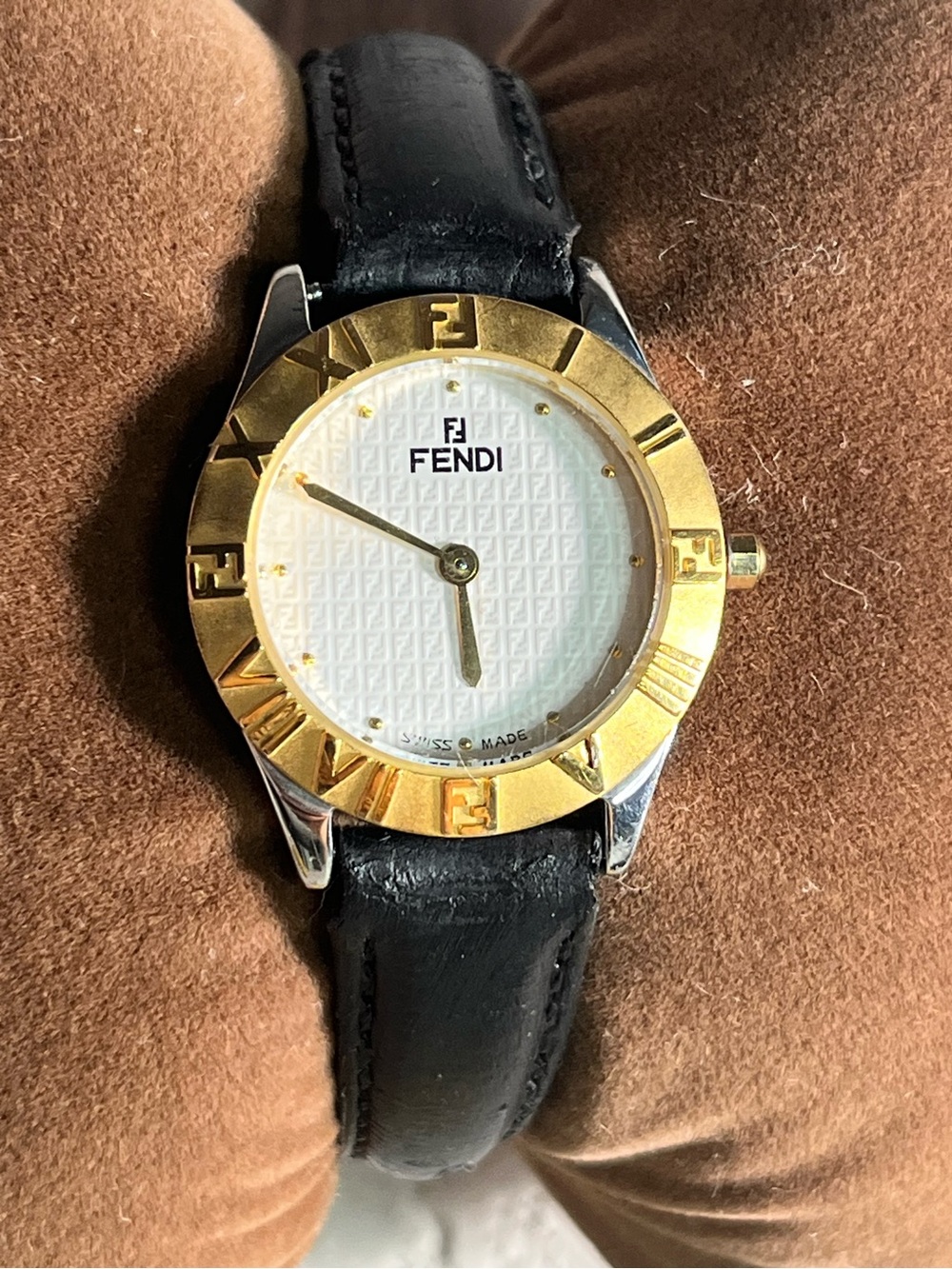 Fendi 2000L gold plated Roman numerals with fendi logo bezel.